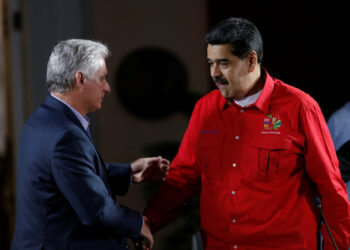 Cuba's President Miguel Diaz Canel shakes hands with Venezuela's President Nicolas Maduro at a meeting of the Sao Paulo Forum in Caracas, Venezuela, July 28, 2019. REUTERS/Manaure Quintero