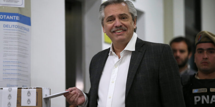 Presidential candidate Alberto Fernandez reacts as he casts a vote at a polling station during the primary elections, in Buenos Aires, Argentina, August 11, 2019.  REUTERS/Agustin Marcarian