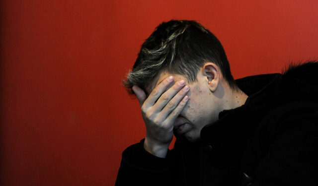 Argentinian Ezequiel Villalonga, 18, a victim of sexual abuse, gestures as he speaks during an interview with AFP at the Association for the Promotion and Protection of Human Rights headquarters, in Mendoza, Argentina on August 1, 2019. - Villalonga reported being victim of sexual abuse when he attended the Antonio Provolo Institute, dedicated to the education of deaf children in Mendoza. The trial of Italian priest Nicola Corradi and Argentinian priest Horacio Corbacho alongside former gardener Armando Gomez over the allegations of sexual abuse will start on August 5. (Photo by Andres Larrovere / AFP)