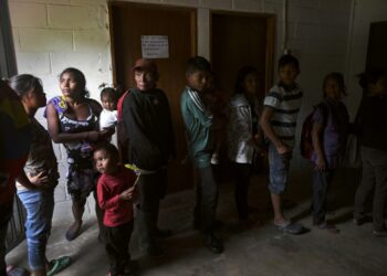 Yukpa natives wait for their turn to have a malaria test done at an improvised laboratory of Los Angeles del Tukuko mission, near Machiques, Zulia state, Venezuela on June 12, 2019. - Malaria, which had been eradicated some years ago among the Yukpa indigenous people, is back in Venezuela due to the crisis. (Photo by YURI CORTEZ / AFP)