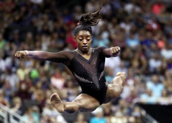 KANSAS CITY, MISSOURI - AUGUST 11:  Simone Biles competes on floor exercise during Women's Senior competition of the 2019 U.S. Gymnastics Championships at the Sprint Center on August 11, 2019 in Kansas City, Missouri. (Photo by Jamie Squire/Getty Images)