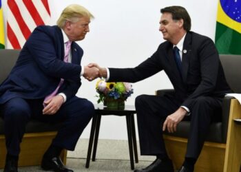 Brazil's President Jair Bolsonaro (R) meets with US President Donald Trump during a bilateral meeting on the sidelines of the G20 Summit in Osaka on June 28, 2019. (Photo by Brendan Smialowski / AFP)