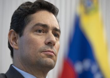 Venezuela's new charge d'affaires to the United States Carlos Vecchio looks on during a press conference in Washington, DC, on January 30, 2019. (Photo by Jim WATSON / AFP) / “The erroneous mention[s] appearing in the metadata of this photo by Jim WATSON has been modified in AFP systems in the following manner: [Venezuela's new charge d'affaires to the United States] instead of [Venezuelan Ambassador]. Please immediately remove the erroneous mention[s] from all your online services and delete it (them) from your servers. If you have been authorized by AFP to distribute it (them) to third parties, please ensure that the same actions are carried out by them. Failure to promptly comply with these instructions will entail liability on your part for any continued or post notification usage. Therefore we thank you very much for all your attention and prompt action. We are sorry for the inconvenience this notification may cause and remain at your disposal for any further information you may require.”