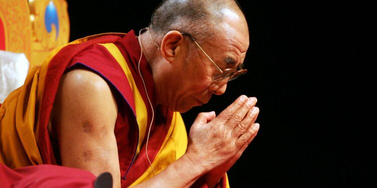 AUCKLAND, NEW ZEALAND - JUNE 18:  The Dalai Lama speaks at the Vector Arena on June 18, 2007 in Auckland, New Zealand.  His Holiness the 14th Dalai Lama of Tibet, spiritual leader to millions of Buddhists around the world, is in New Zealand on a three day visit to give public talks and for public teachings.        (Photo by Jeff Brass/Getty Images)