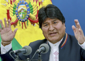 Handout picture relased by the Bolivian Presidency of Bolivian President Evo Morales speaking during a press conference at the Casa Grande del Pueblo (Great House of the People) in La Paz, on August 13, 2019. - Argentina's President Mauricio Macri defeat by populist candidate Alberto Fernandez in the  primary elections last Sunday, is a "rebellion" against the IMF's economic model, Bolivian president Evo Morales said on Tuesday, worried about the repercussions on the economy of his country. (Photo by HO / Bolivian Presidency / AFP) / RESTRICTED TO EDITORIAL USE - MANDATORY CREDIT "AFP PHOTO / BOLIVIAN PRESIDENCY " - NO MARKETING NO ADVERTISING CAMPAIGNS - DISTRIBUTED AS A SERVICE TO CLIENTS