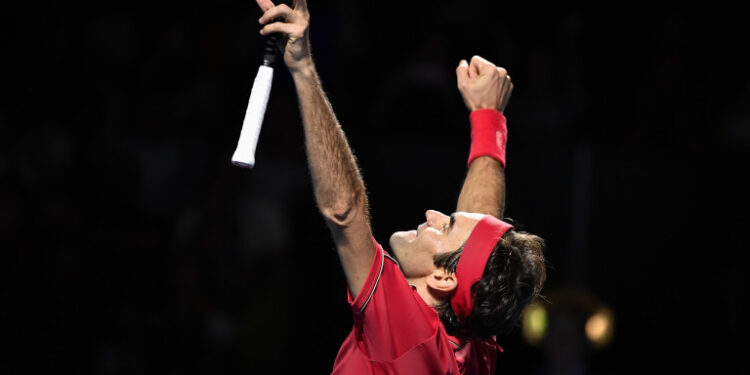 Swiss Roger Federer celebrates his victory during the final match at the Swiss Indoors tennis tournament in Basel on October 27, 2019. (Photo by FABRICE COFFRINI / AFP)