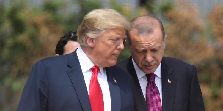 BRUSSELS, BELGIUM - JULY 11:  U.S. President Donald Trump (L) and Turkish President Recep Tayyip Erdogan attend the opening ceremony at the 2018 NATO Summit at NATO headquarters on July 11, 2018 in Brussels, Belgium. Leaders from NATO member and partner states are meeting for a two-day summit, which is being overshadowed by strong demands by U.S. President Trump for most NATO member countries to spend more on defense.  (Photo by Sean Gallup/Getty Images)