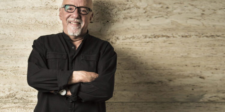 Brasilian writer Paulo Coelho photographed in the building where he lives in Geneva, Switzerland. CREDIT: Niels Ackermann / Rezo.ch for The Wall Street Journal