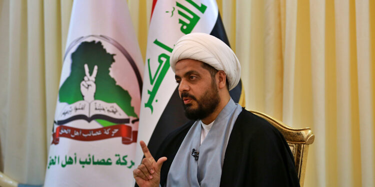 Qais al-Khazali, the leader of the militant Shiite group Asaib Ahl al-Haq, or League of the Righteous, speaks during an interview with The Associated Press in Baghdad, Iraq, Monday, Jan. 28, 2019. Al-Khazali said Monday that he expects a vote by the Iraqi parliament calling for the withdrawal of U.S. troops from the country within the next few months. Al-Khazali said there is no longer a justification for thousands of U.S. troops in the country after the Islamic State group has been defeated. (AP Photo/Khalid Mohammed)