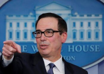 FILE PHOTO: U.S. Treasury Secretary Steven Mnuchin announces the Trump administration's economic sanctions against the Venezuelan state owned oil company Petroleos de Venezuela (PdVSA) during a press briefing at the White House in Washington, U.S., January 28, 2019. REUTERS/Jim Young/File Photo