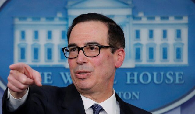 FILE PHOTO: U.S. Treasury Secretary Steven Mnuchin announces the Trump administration's economic sanctions against the Venezuelan state owned oil company Petroleos de Venezuela (PdVSA) during a press briefing at the White House in Washington, U.S., January 28, 2019. REUTERS/Jim Young/File Photo