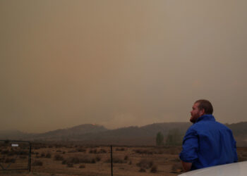 Local resident Peter Lawlis monitors an approaching bushfire at his property in Bredbo, New South Wales, Australia, February 1, 2020.  REUTERS/Loren Elliott