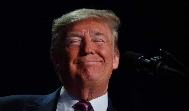 US President Donald Trump speaks at the 68th annual National Prayer Breakfast on February 6, 2020 in Washington,DC. - President Donald Trump said Thursday that he suffered a "terrible ordeal" during his impeachment. In his first public comments since being acquitted by the Senate of abuse of office, he said he had been "put through a terrible ordeal by some very dishonest and corrupt people." "They have done everything possible to destroy us and by so doing very badly hurt our nation," he said at a televised prayer breakfast with a Who's Who of Washington power brokers. (Photo by Nicholas Kamm / AFP)