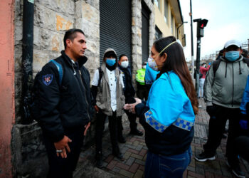 Municipal police carry out controls on the streets, in Quito, Ecuador, 17 March 2020. The Ecuadorian capital woke up under the suspension of the use of public space, which includes sidewalks, driveways and parks, among others, while the Executive has decreed a state of emergency in the country, in the context of the coronavirus health emergency. The confirmed cases in Ecuador almost doubled and from the 58 registered on Monday they went to 111 (two of them deceased), reported the head of the National Risk and Emergency Management Service (SNGRE), Alexandra Ocles. EFE/ Jose Jacome