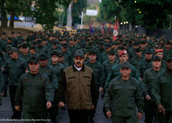 Venezuela's President Nicolas Maduro walks next to Venezuela's Defense Minister Vladimir Padrino Lopez and Remigio Ceballos, Strategic Operational Commander of the Bolivarian National Armed Forces, during a ceremony at a military base in Caracas, Venezuela May 2, 2019. (© Miraflores Palace/Handout/Reuters Pictures)