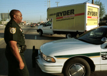 382633 02: A Ryder truck carrying presidential election ballots from West Palm Beach County is escorted by law enforcement officers at the beginning of its trip to Tallahassee, November 30, 2000 in West Palm Beach, Florida. (Photo by Robert King/Newsmakers)