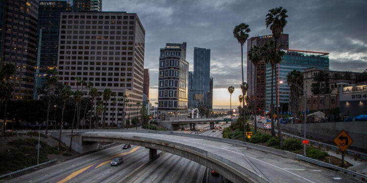 (FILES) In this file photo taken on March 15, 2020, the 110 Freeeway is seen in downtown Los Angeles, California. - Another 6.65 million US workers filed for unemployment benefits last week, the most ever recorded, as the coronavirus forces businesses to shut down nationwide, the Labor Department reported on April 2, 2020. (Photo by Apu GOMES / AFP)