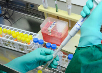 A staff member of the health authorities of the southern federal state of Baden-Wuerttemberg demonstrates on a negative sample the test for the coronavirus SARS-CoV-2, in a laboratory in Stuttgart, southern Germany, on March 2, 2020. - The death toll from the new coronavirus epidemic surpassed 3,000 on Monday, March 2, 2020, as more people died in China, Iran and the US and Europe raised its state of alert. EU president Ursula von der Leyen said the European Centre for Disease Prevention and Control (ECDC) had increased its risk assessment for Europeans after Italy's outbreak doubled in 48 hours. (Photo by THOMAS KIENZLE / AFP) (Photo by THOMAS KIENZLE/AFP via Getty Images)