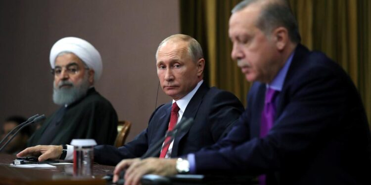 Vladímir Putin, Recep Tayyip Erdogan y Hasán Rohaní. Foto de archivo.