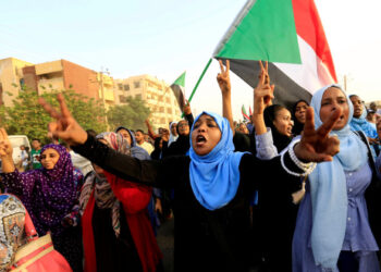 REFILE - REMOVING ERRONEOUS WORD  Sudanese protesters march during a demonstration to commemorate 40 days since the sit-in massacre in Khartoum North, Sudan July 13, 2019. REUTERS/Mohamed Nureldin Abdallah - RC18149625F0