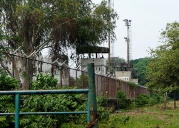 Security towers are seen at Los Llanos penitentiary after a riot erupted inside the prison leaving dozens of dead as the coronavirus disease (COVID-19) continues in Guanare, Venezuela May 2, 2020. REUTERS/Freddy Rodriguez NO RESALES. NO ARCHIVE.