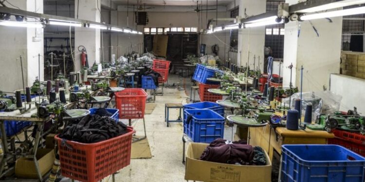 In this photo taken on April 7, 2020, a general view shows an empty garment factory during a government-imposed lockdown as a preventive measure against the COVID-19 coronavirus, in Ashulia on the outskirts of Dhaka. - One day Parvin was toiling to meet the fast-fashion demands of European capitals, the next she was among hundreds of thousands of Bangladeshi clothes workers made instantly jobless as the coronavirus pandemic struck. Big-name international brands have cancelled billions of dollars in orders because of the pandemic, decimating Bangladesh's most important export industry and hurting in particular rural woman who dominate the workforce. (Photo by MUNIR UZ ZAMAN / AFP)