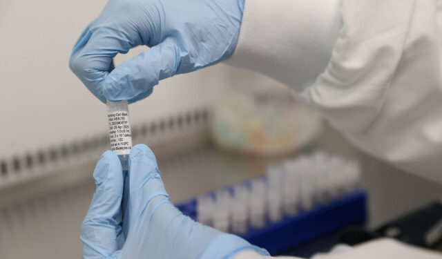 Scientists are seen working at Cobra Biologics, they are working on a potential vaccine for COVID-19, following the outbreak of the coronavirus disease (COVID-19), in Keele, Britain, April 30, 2020.  REUTERS/Carl Recine