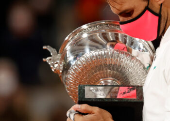 Tennis - French Open - Roland Garros, Paris, France - October 11, 2020 Spain’s Rafael Nadal celebrates with the trophy after winning the French Open final against Serbia’s Novak Djokovic REUTERS/Christian Hartmann