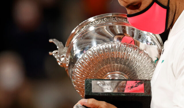 Tennis - French Open - Roland Garros, Paris, France - October 11, 2020 Spain’s Rafael Nadal celebrates with the trophy after winning the French Open final against Serbia’s Novak Djokovic REUTERS/Christian Hartmann