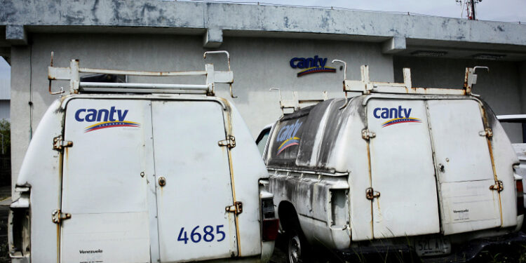 FILE PHOTO: Trucks of Venezuela's national telecommunications company CANTV are seen at one of its facilities in Barinas, Venezuela September 25, 2018. Picture taken September 25, 2018. REUTERS/Carlos Eduardo Ramirez/File Photo