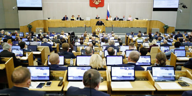 Russian Prime Minister Mikhail Mishustin reports lawmakers on the government work in 2019 at the State Duma, the lower chamber of Russia's parliament, in Moscow on July 22, 2020. (Photo by Dmitry ASTAKHOV / SPUTNIK / AFP) (Photo by DMITRY ASTAKHOV/SPUTNIK/AFP via Getty Images)