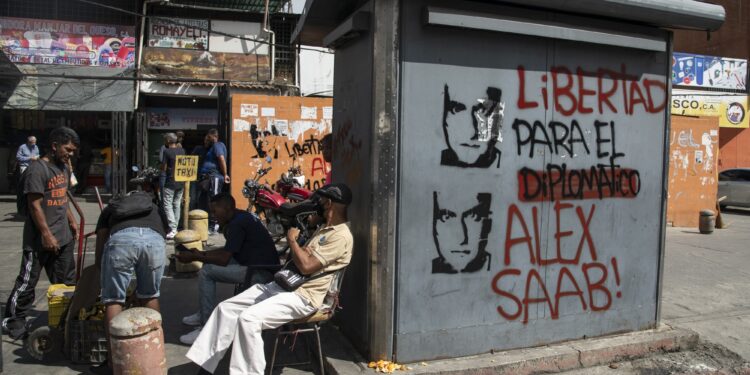 Graffiti that reads in Spanish “Freedom For The Diplomat Alex Saab” in Caracas, on Feb. 4.Photographer: Carlos Becerra/Bloomberg