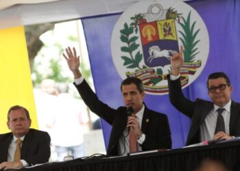 Venezuelan National Assembly President and opposition leader Juan Guaido, who many nations have recognised as the country's rightful interim ruler, takes part in a session of Venezuela's National Assembly with First Vice President Juan Pablo Guanipa and Second Vice President Carlos Berrizbeitia at a square in Caracas, Venezuela February 12, 2020. REUTERS/Manaure Quintero