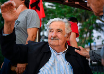 Uruguay's former President (2010-2015) and candidate for senator for the Frente Amplio ruling party, Jose Mujica, is greeted by supporters in Montevideo, on October 25, 2019, ahead of Sunday's general election.  / AFP / Eitan ABRAMOVICH