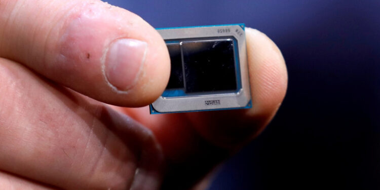 FILE PHOTO: An Intel Tiger Lake chip is displayed at an Intel news conference during the 2020 CES in Las Vegas, Nevada, U.S. January 6, 2020. REUTERS/Steve Marcus/File Photo