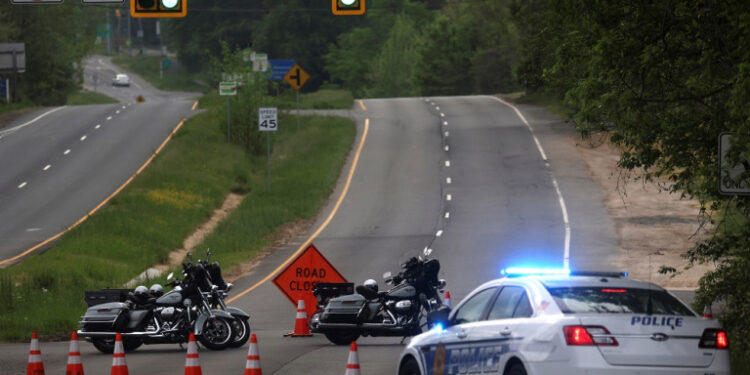 Dolley Madison Boulevard is blocked off by law enforcement in response to a security-related situation outside of the secure perimeter near the main gate of CIA headquarters in McLean, Virginia, U.S. May 3, 2021. REUTERS/Leah Millis