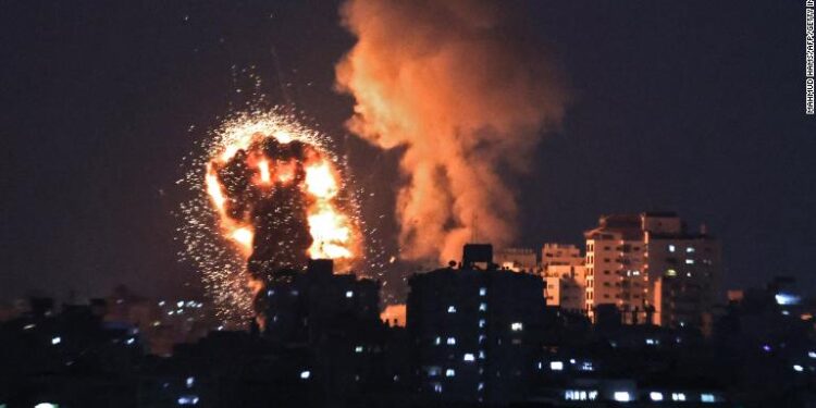 A picture shows Israeli air strikes in the Gaza Strip, controlled by the Palestinian Islamist movement Hamas, on May 10, 2021. - Israel launched deadly air strikes on Gaza in response to a barrage of rockets fired by the Islamist movement Hamas amid spiralling violence sparked by unrest at Jerusalem's Al-Aqsa Mosque compound. (Photo by MAHMUD HAMS / AFP) (Photo by MAHMUD HAMS/AFP via Getty Images)