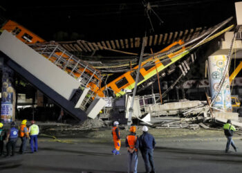 The site where an overpass for a metro partially collapsed with train cars on it is seen at Olivos station in Mexico City, Mexico May 4, 2021. REUTERS/Carlos Jasso