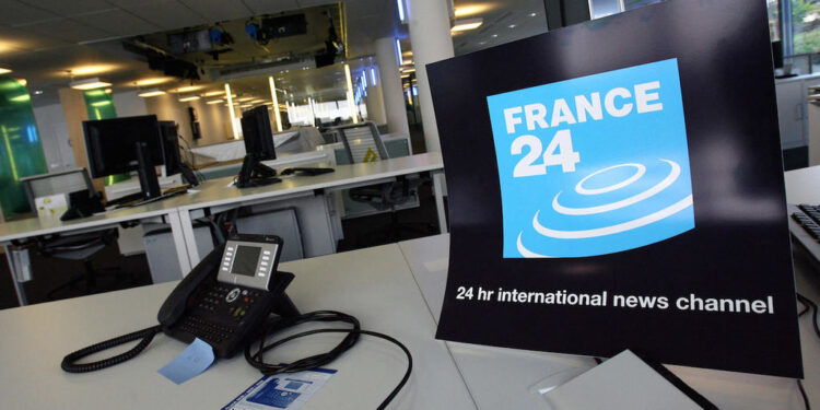 The logo of the French new international news TV channel is seen 13 September 2006 in the editing room at the headquarters in Issy-les-Moulineaux, Paris suburbs, as the board holds a press conference to present the new channel. Some 162 journalist coming from 25 countries have been recruited for the channel which is scheduled to launch between 25 November and 05 December 2006. The broadcast will be via satellite in French and English to Europe, Africa, the Middle East and possibly part of North America. First ground, the video camera used by the reporters.  AFP PHOTO FRANCK FIFE (Photo by FRANCK FIFE / AFP)