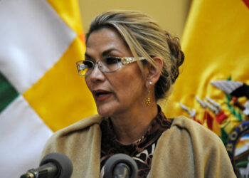 Bolivian interim President Jeanine Anez speaks during the ceremony in which Bolivian Salvador Romero Ballivian was sworn in as member of the Supreme Electoral Tribunal (TSE), ahead of new elections at the Quemado Palace in La Paz on November 25, 2019. - Bolivia's interim President Jeanine Anez signed off on new elections Sunday, in a key step towards ending weeks of unrest and turning the page on Latin American leftist icon Evo Morales. (Photo by Jorge Bernal / AFP)