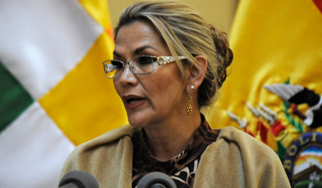 Bolivian interim President Jeanine Anez speaks during the ceremony in which Bolivian Salvador Romero Ballivian was sworn in as member of the Supreme Electoral Tribunal (TSE), ahead of new elections at the Quemado Palace in La Paz on November 25, 2019. - Bolivia's interim President Jeanine Anez signed off on new elections Sunday, in a key step towards ending weeks of unrest and turning the page on Latin American leftist icon Evo Morales. (Photo by Jorge Bernal / AFP)