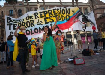 MALAGA, SPAIN - 2021/05/22: A Colombian protester shouts slogans through a megaphone  during the demonstration at Plaza de la Constitucion square.
Colombian residents in Malaga take to the streets again in solidarity with the Colombians and against the government of President Iván Duque as negotiations continue between the Colombian government and the committee of the national strike after protests and violent clashes erupted in the country. (Photo by Jesus Merida/SOPA Images/LightRocket via Getty Images)