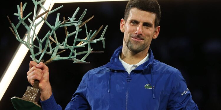 Paris (France), 07/11/2021.- Novak Djokovic of Serbia celebrates with the trophy after winning the final match against Daniil Medvedev of Russia at the Rolex Paris Masters tennis tournament in Paris, France, 07 November 2021. (Tenis, Francia, Rusia) EFE/EPA/CHRISTOPHE PETIT TESSON