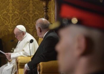 A handout picture provided by the Vatican Media shows Malta's President George Vella (C) and Pope Francis as they both address the authorities and the diplomatic corps in the Grand Council Chamber of the Grand Master's Presidential Palace in Valletta, Malta, 02 April, 2022.