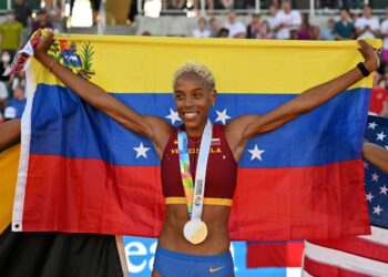 Venezuela's Yulimar Rojas celebrates winning the women's triple jump final during the World Athletics Championships at Hayward Field in Eugene, Oregon on July 18, 2022. (Photo by ANDREJ ISAKOVIC / AFP)