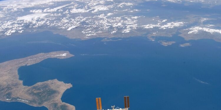 (FILES) In this file photo taken on August 19, 2007 Backdropped by Earth's horizon and the blackness of space, the International Space Station appears to be very small as it moves away from Space Shuttle Endeavour NASA handout image. - Russia has decided to quit the International Space Station "after 2024", the newly-appointed chief of Moscow's space agency told President Vladimir Putin on July 26, 2022. The announcement comes as tensions rage between the Kremlin and the West over Moscow's military intervention in Ukraine and several rounds of unprecedented sanctions against Russia. (Photo by Handout / NASA / AFP)