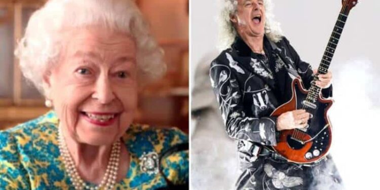 La reina Isabel II (+) y el guitarrista de Queen, Brian May. Foto de archivo.