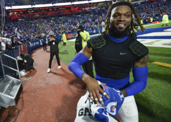 Buffalo Bills safety Damar Hamlin celebrates after an NFL football game against the New York Jets, Sunday, Jan. 9, 2022, in Orchard Park, N.Y. (AP Photo/Adrian Kraus)