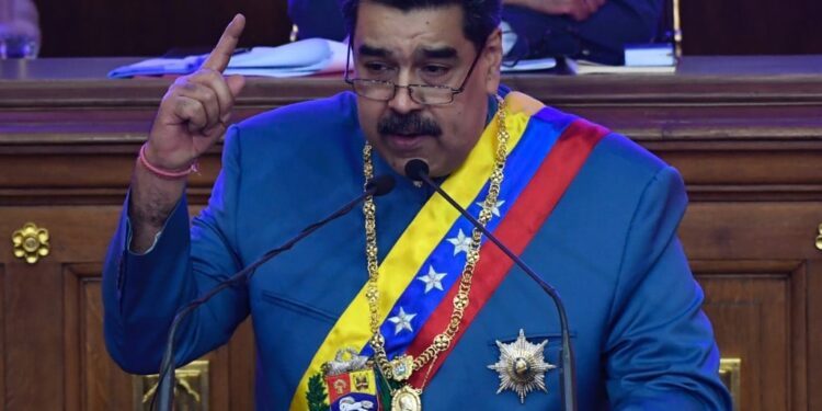 Venezuelan President Nicolas Maduro gestures as he presents the annual report of his government before the National Assembly in Caracas on January 12, 2021. (Photo by Federico Parra / AFP)