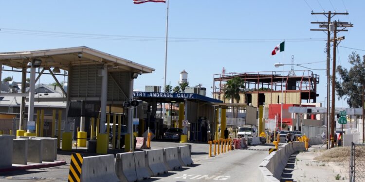 The border crossing buildings between the United States town of Andrade and the Mexican town of Algodones near Yuma Arizona